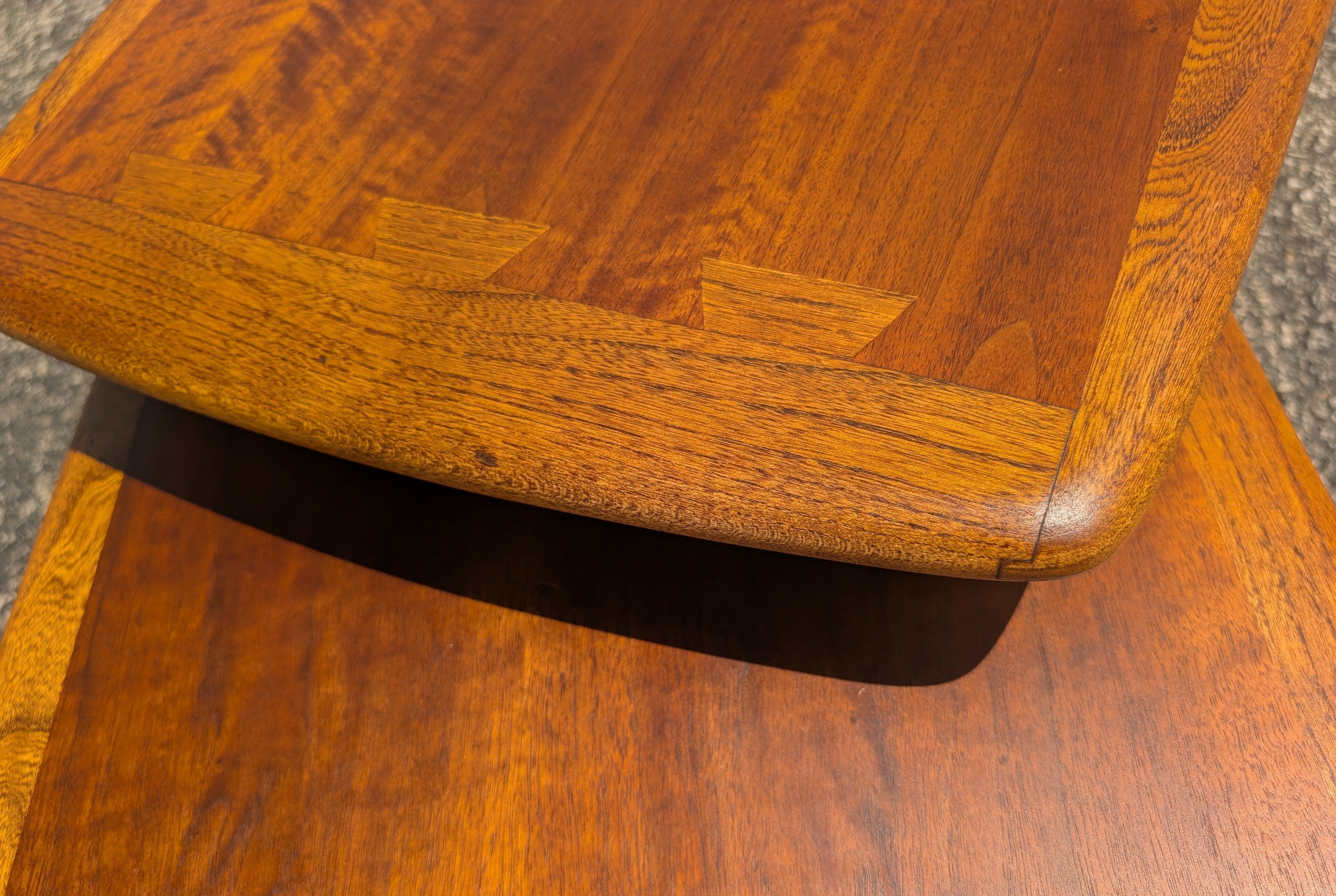 Close-up of a wooden table with a visible grain pattern